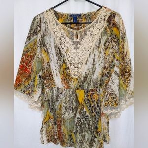 Flowy blouse with winged sleeves